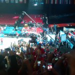 Showing the trophy to fans