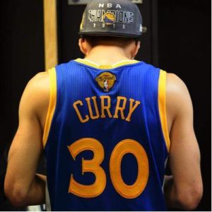 Curry celebrating his first NBA championship