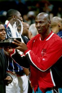 Michael Jordan wearing the jacket while he receives the 1996 All Star MVP award
