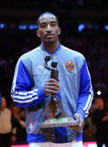 JR receiving the NBA Sixth Man of the Year award