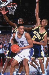 Jalen Rose and Chris Webber making a trap over Grant Hill during the 1992 NCAA Final Four
