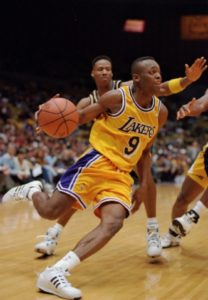 Van Exel in action with the jersey. However the Lakers players finally used the purple jersey at the 1998 NBA All Star