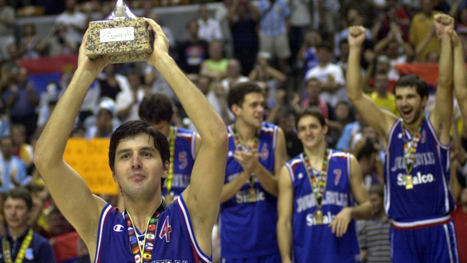 Dejan receiving the World Cup trophy