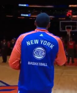 Ron Artest as "Metta World Peace" wearing a similar item during the 2013/2014 NBA Opening Night