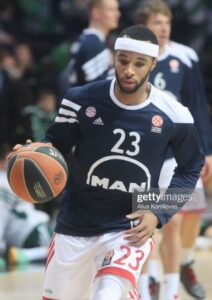 Malcolm Delaney in action with the item and Robin Benzing at the bottom