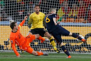 Andrés Iniesta scoring the first and last goal of the match in overtime