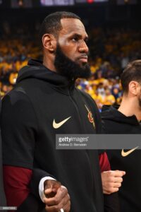 Lebron and Calderon during the national anthem of the 2018 NBA Finals game 2 at the Oracle Arena
