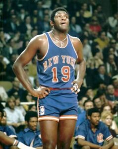 Willis Reed in action with the jersey