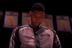 The opponent Tim Duncan wearing a similar jacket during the Game 1 intro